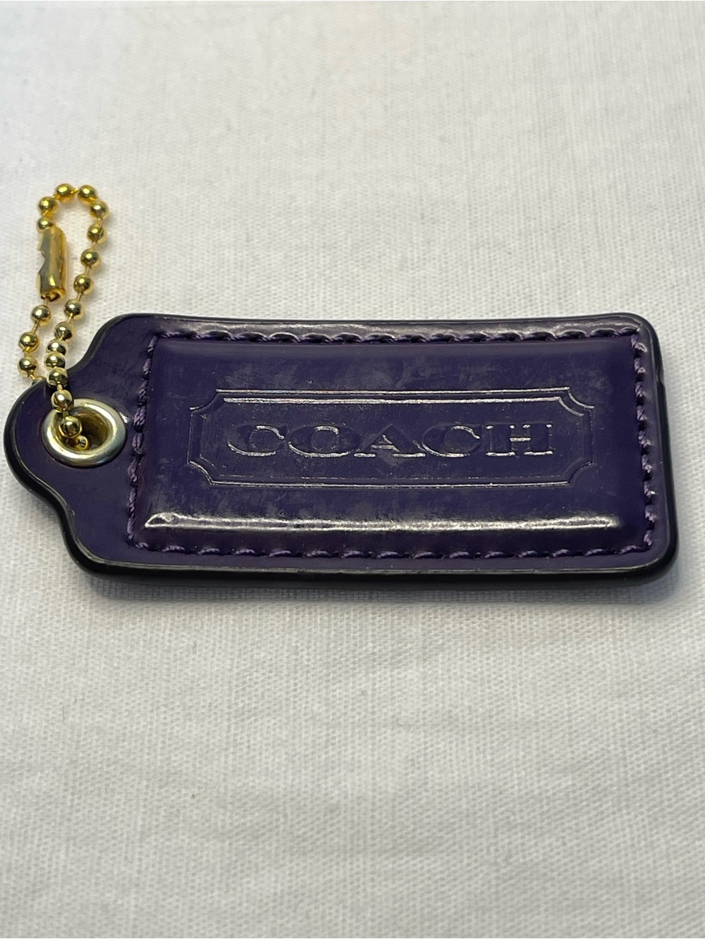 Coach Purple Leather Hang Tag with Gold Ball Chain